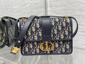 Dior 30 Montaigne bag Dior Oblique jacquard canvas with gold-finish hardware.