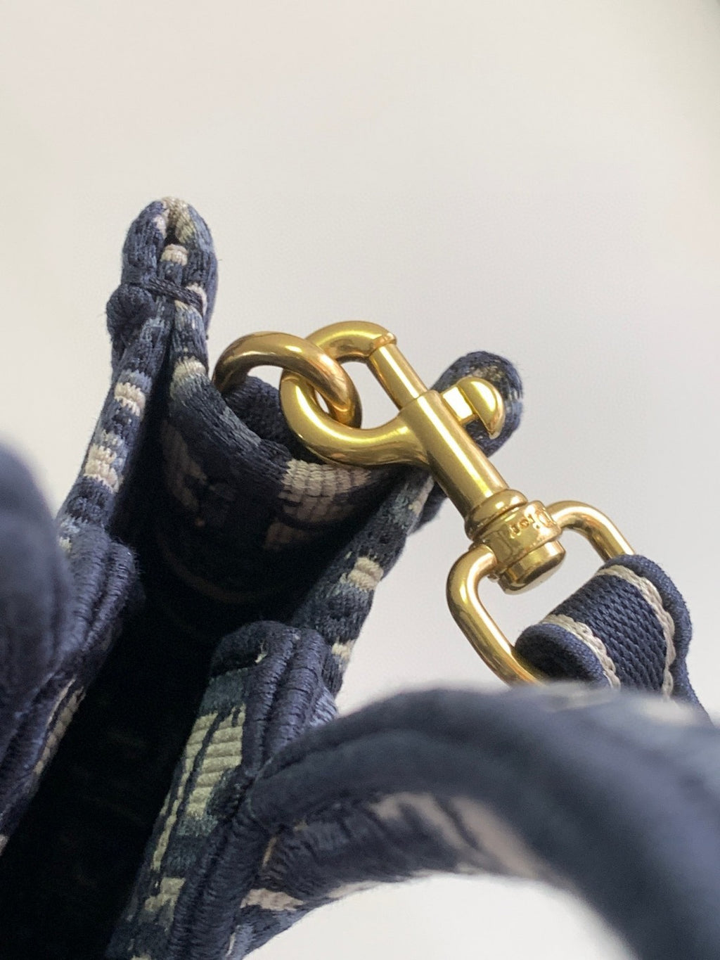 Mini or East-West Dior Book Tote with a strap, featuring blue Dior Oblique embroidery and calfskin