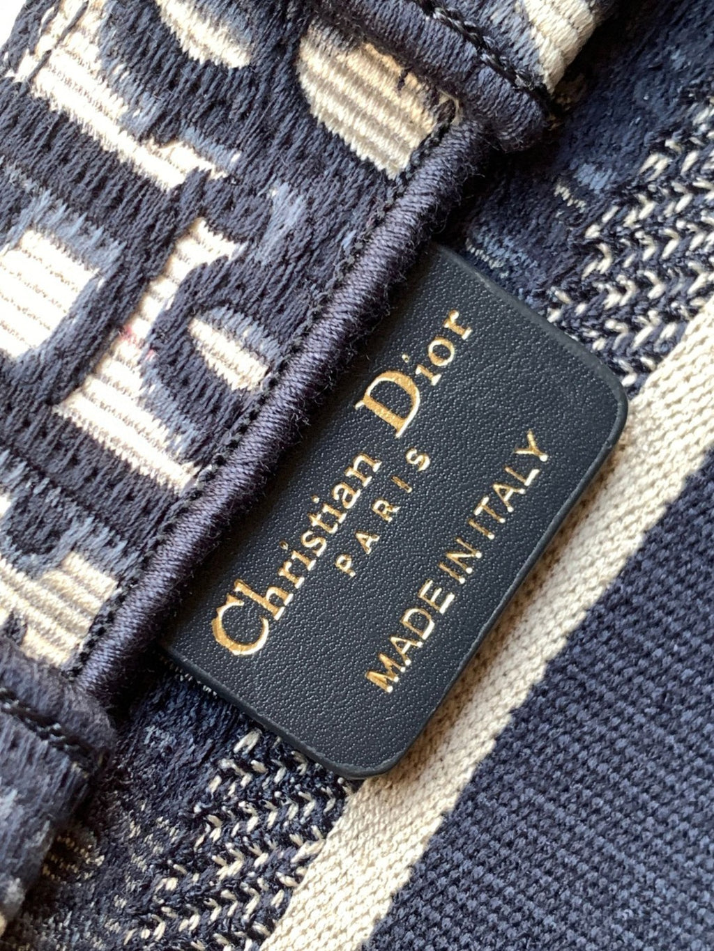 Mini or East-West Dior Book Tote with a strap, featuring blue Dior Oblique embroidery and calfskin