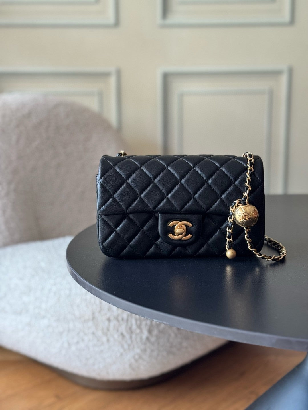 Chanel Small Rectangular Pearl Crush Flap bag in black lambskin leather with gold-tone hardware