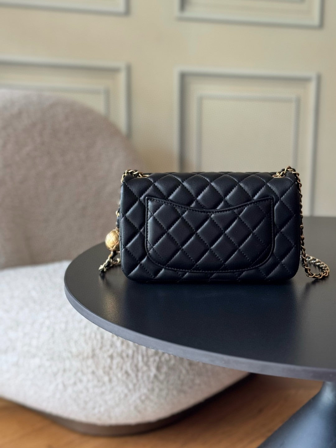Chanel Small Rectangular Pearl Crush Flap bag in black lambskin leather with gold-tone hardware