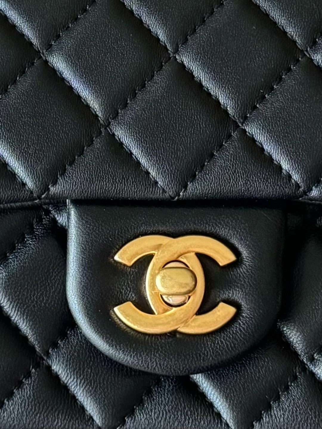 Chanel Small Rectangular Pearl Crush Flap bag in black lambskin leather with gold-tone hardware