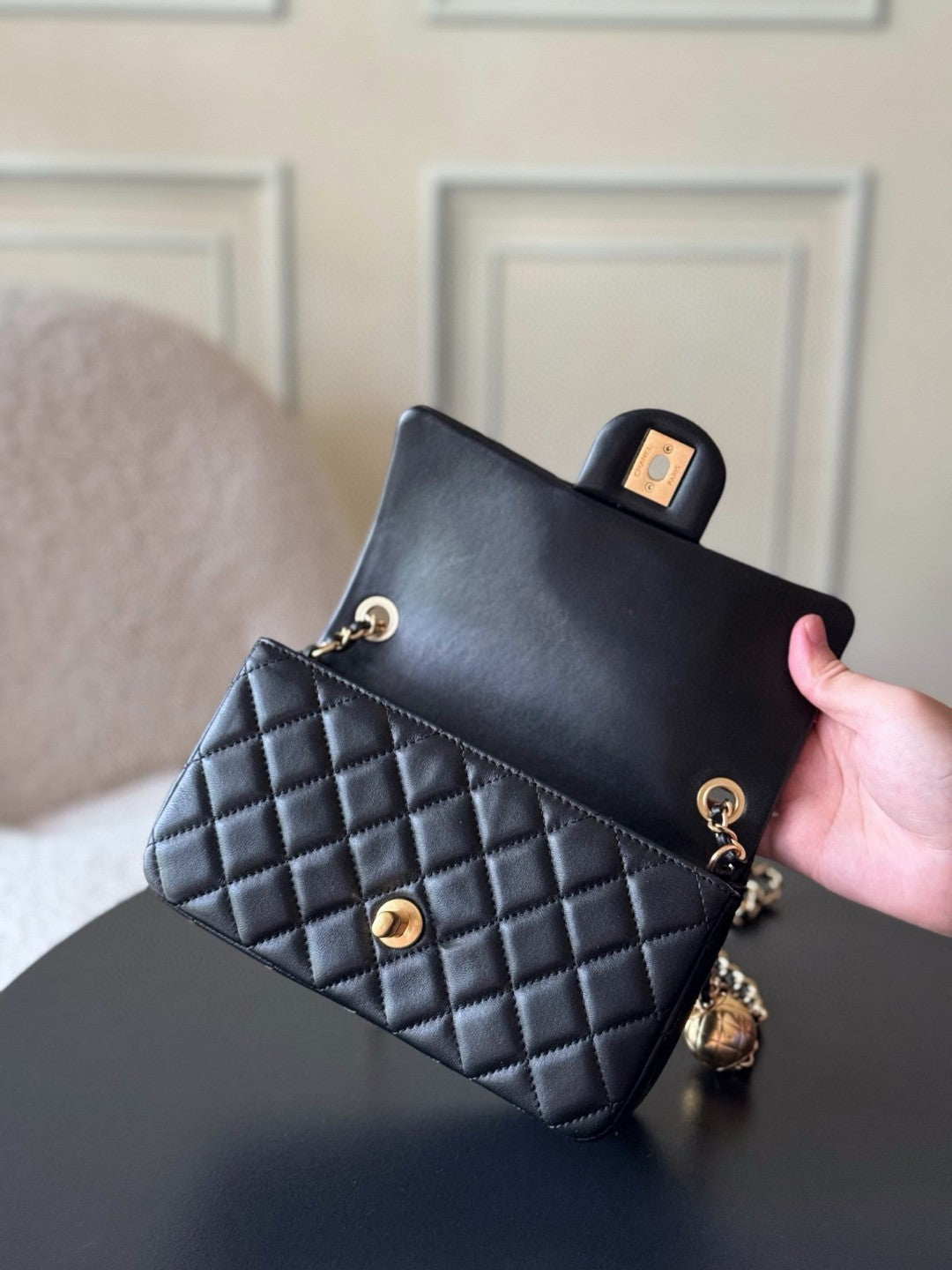 Chanel Small Rectangular Pearl Crush Flap bag in black lambskin leather with gold-tone hardware