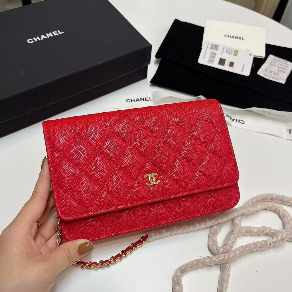 Chanel Wallet on Chain (WOC) bag in red caviar leather with gold-tone hardware