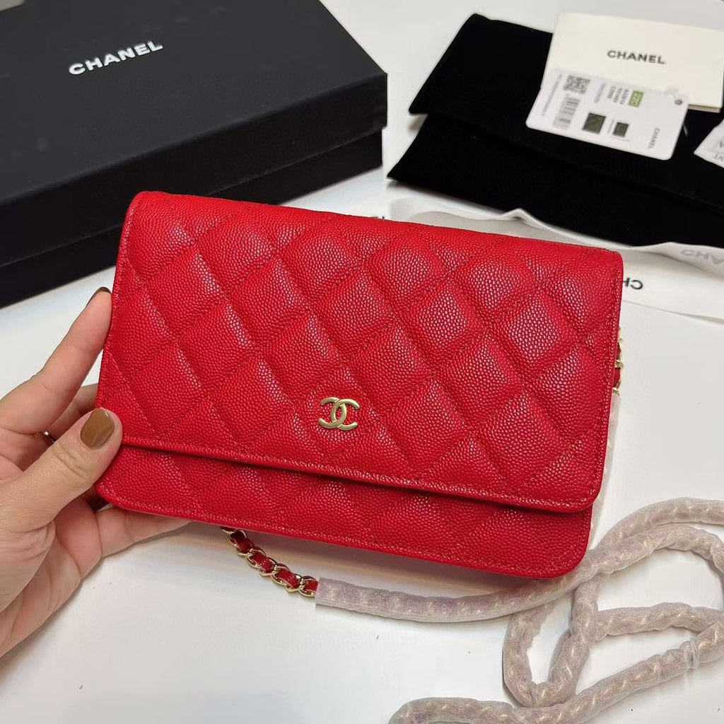 Chanel Wallet on Chain (WOC) bag in red caviar leather with gold-tone hardware