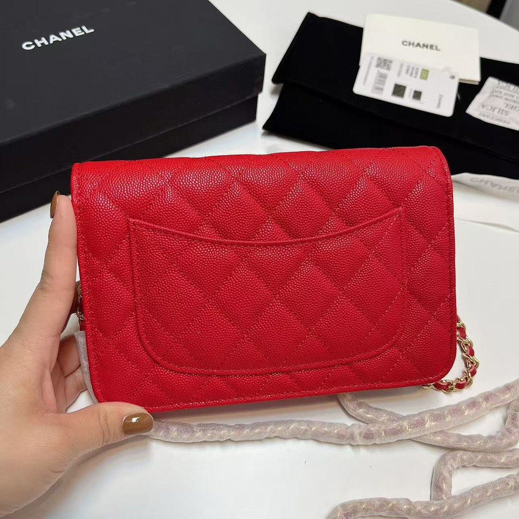 Chanel Wallet on Chain (WOC) bag in red caviar leather with gold-tone hardware