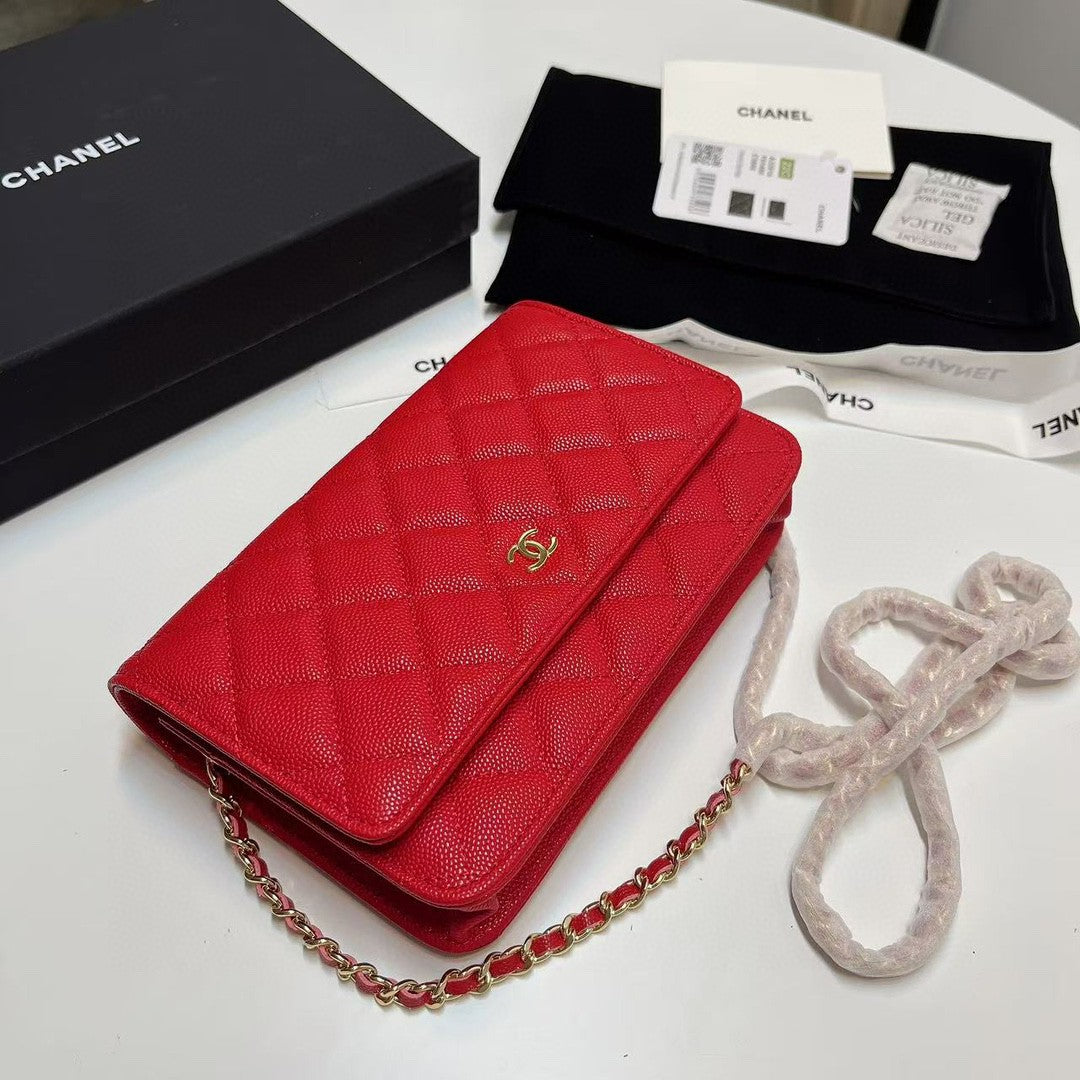 Chanel Wallet on Chain (WOC) bag in red caviar leather with gold-tone hardware