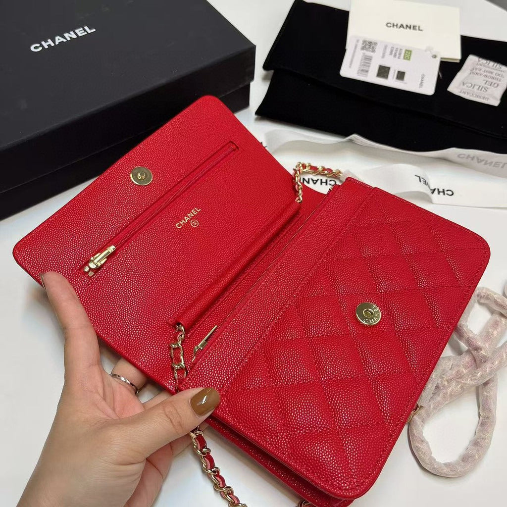Chanel Wallet on Chain (WOC) bag in red caviar leather with gold-tone hardware