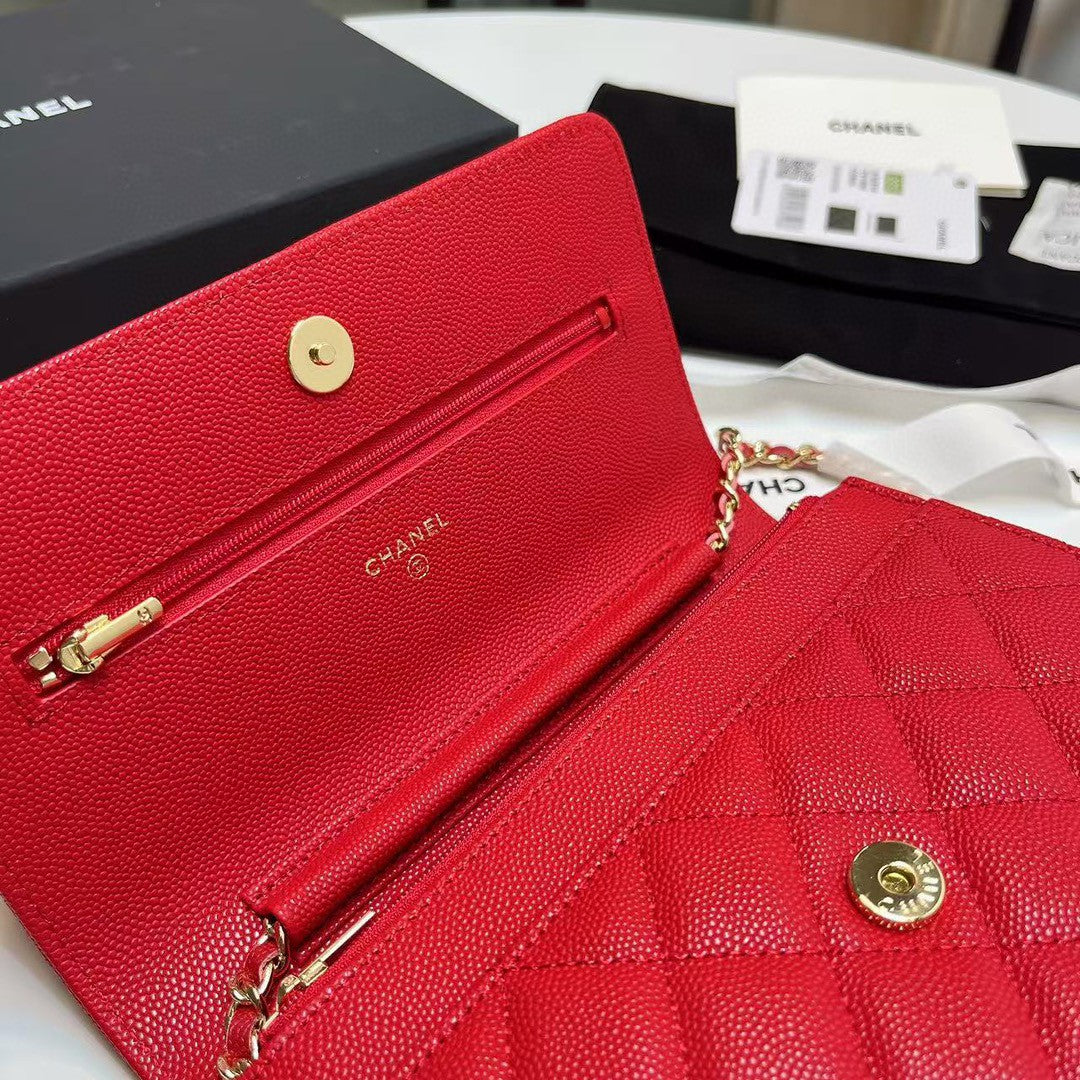 Chanel Wallet on Chain (WOC) bag in red caviar leather with gold-tone hardware