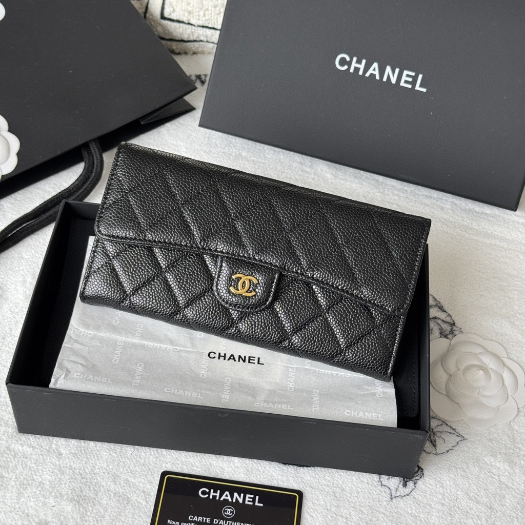 Chanel Classic Long Flap Wallet in black caviar leather with gold-tone hardware