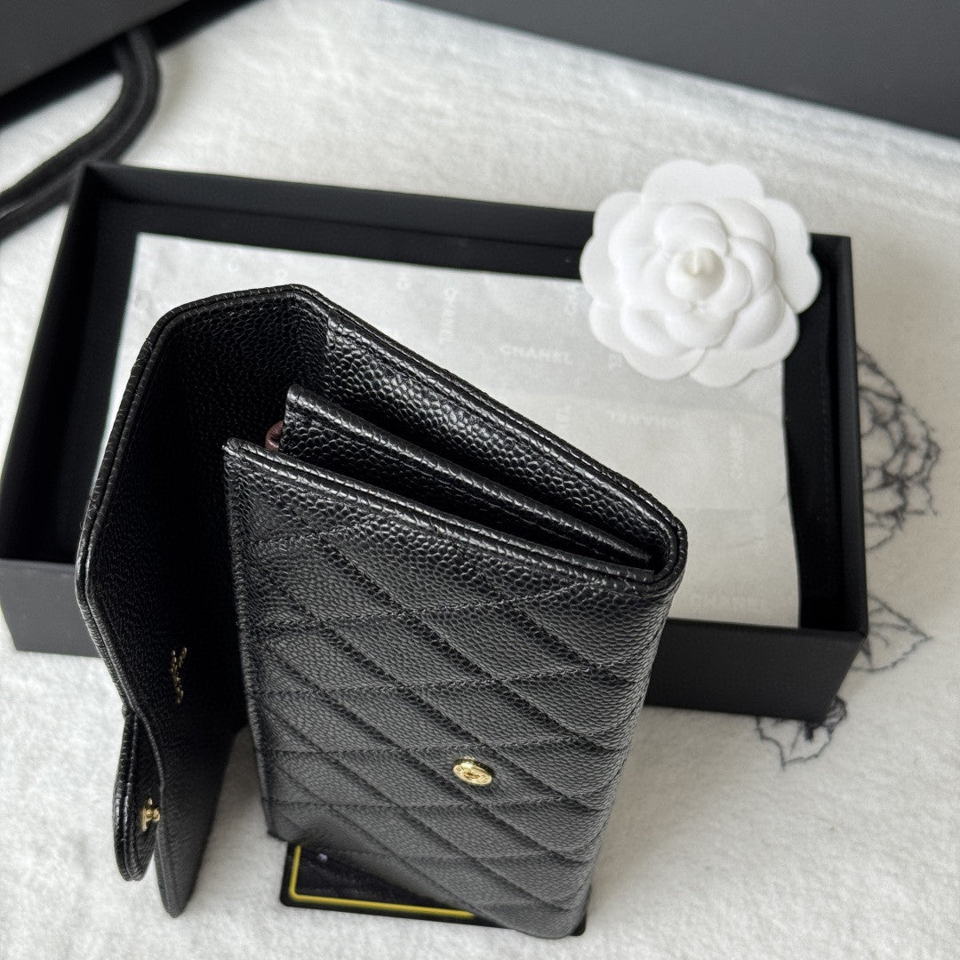 Chanel Classic Long Flap Wallet in black caviar leather with gold-tone hardware