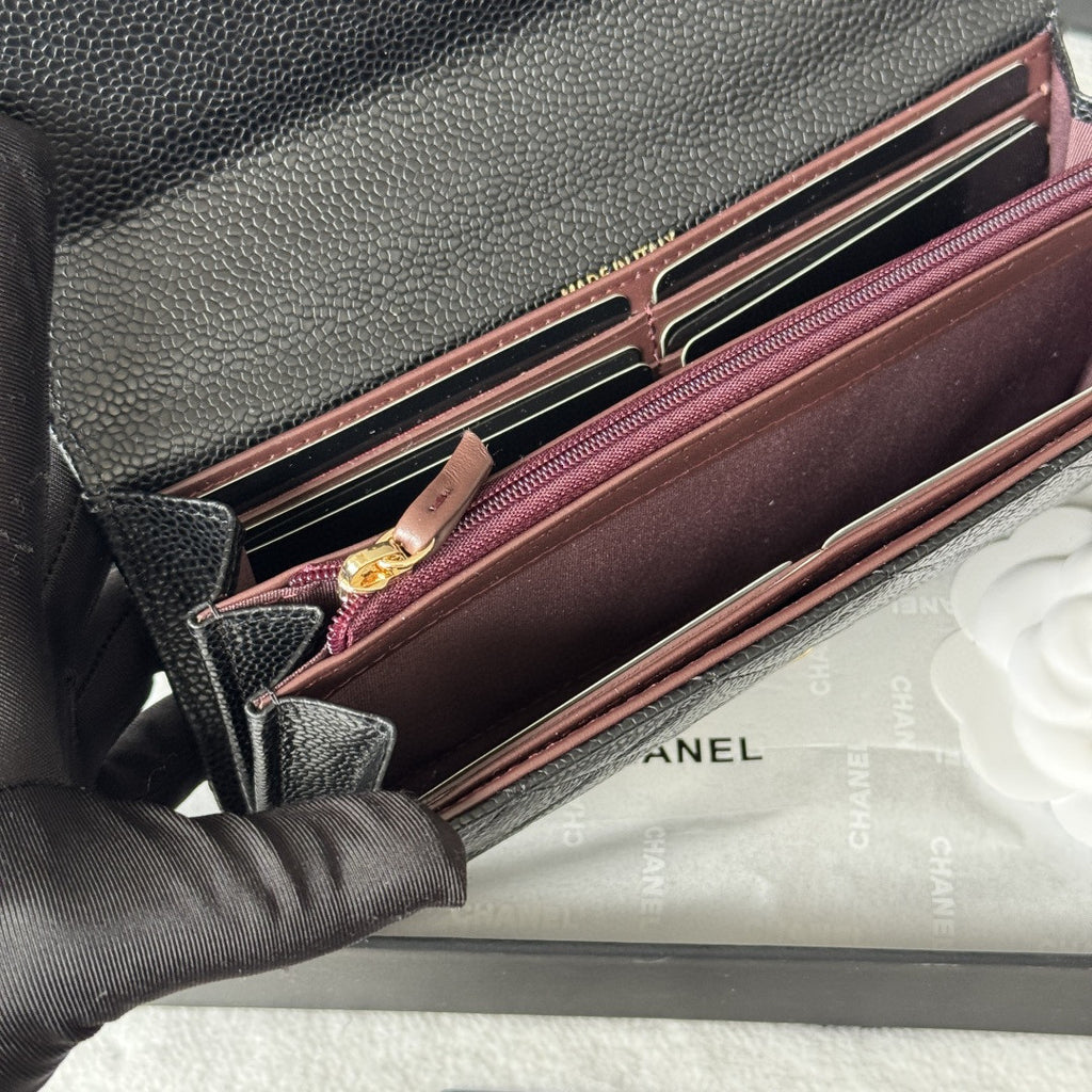 Chanel Classic Long Flap Wallet in black caviar leather with gold-tone hardware