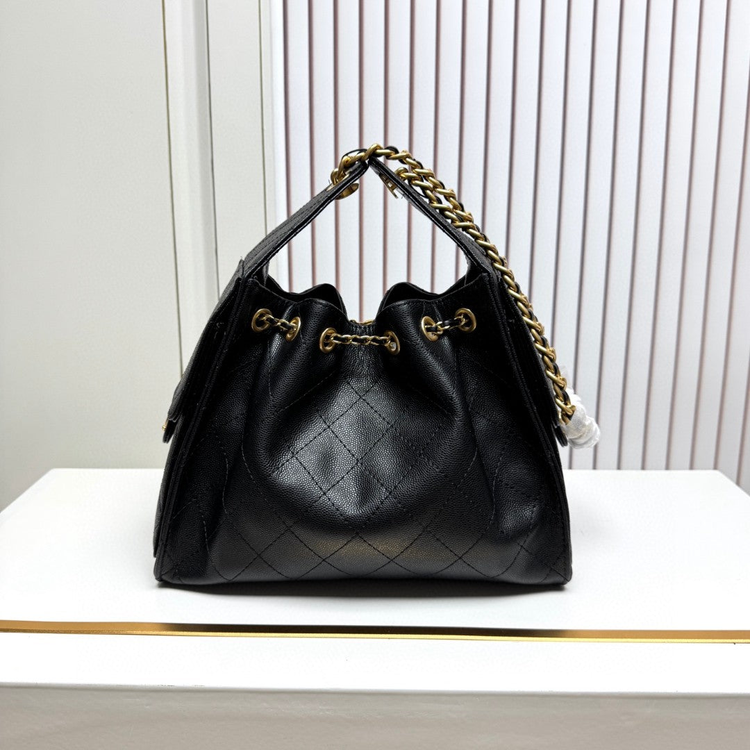 Chanel 25 Small Hobo Bag in black caviar leather with antique gold-tone hardware