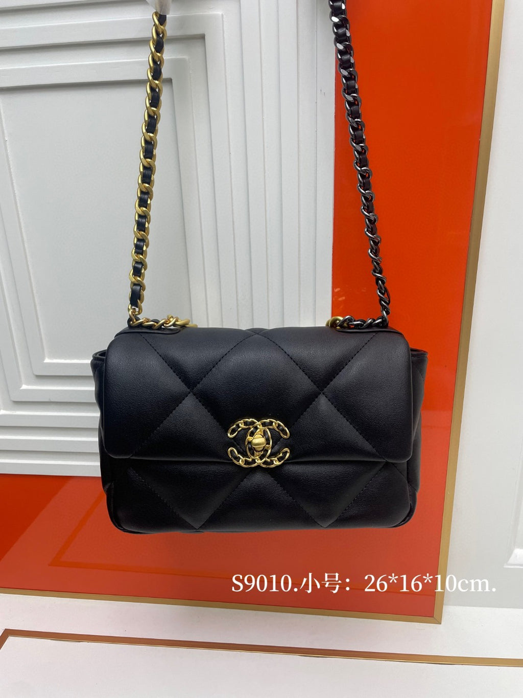 black Chanel 19 flap bag in lambskin with gold-tone