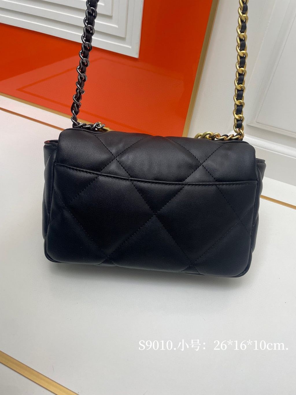 black Chanel 19 flap bag in lambskin with gold-tone