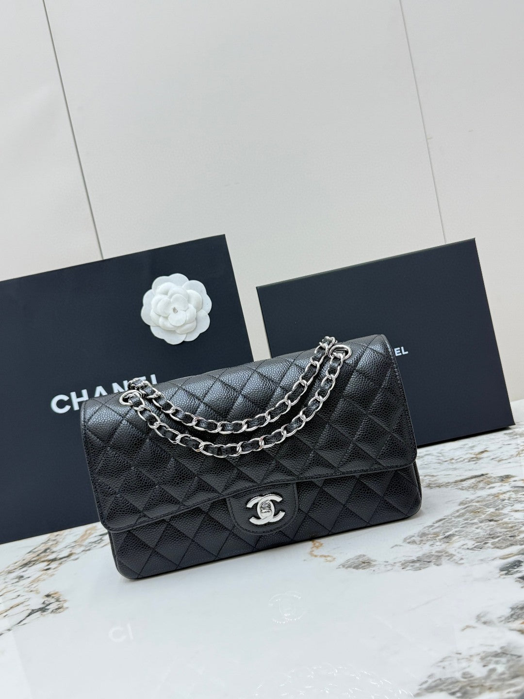 Chanel Classic Double Flap Medium bag in black caviar leather with silver-tone hardware