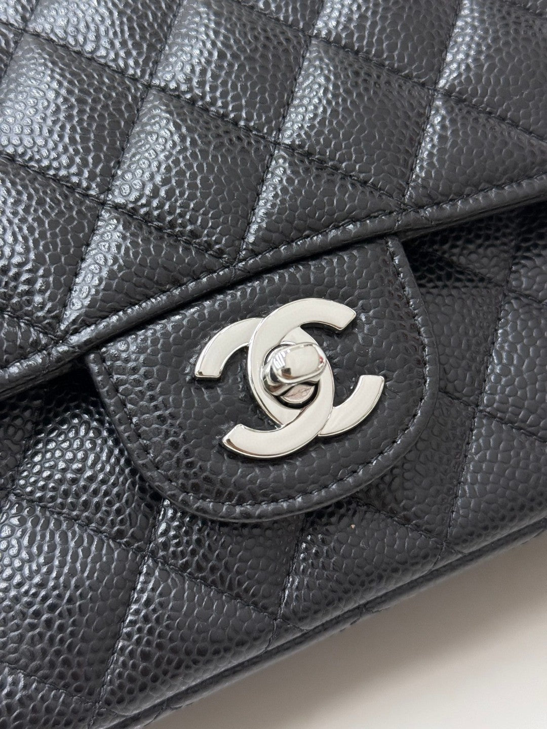 Chanel Classic Double Flap Medium bag in black caviar leather with silver-tone hardware