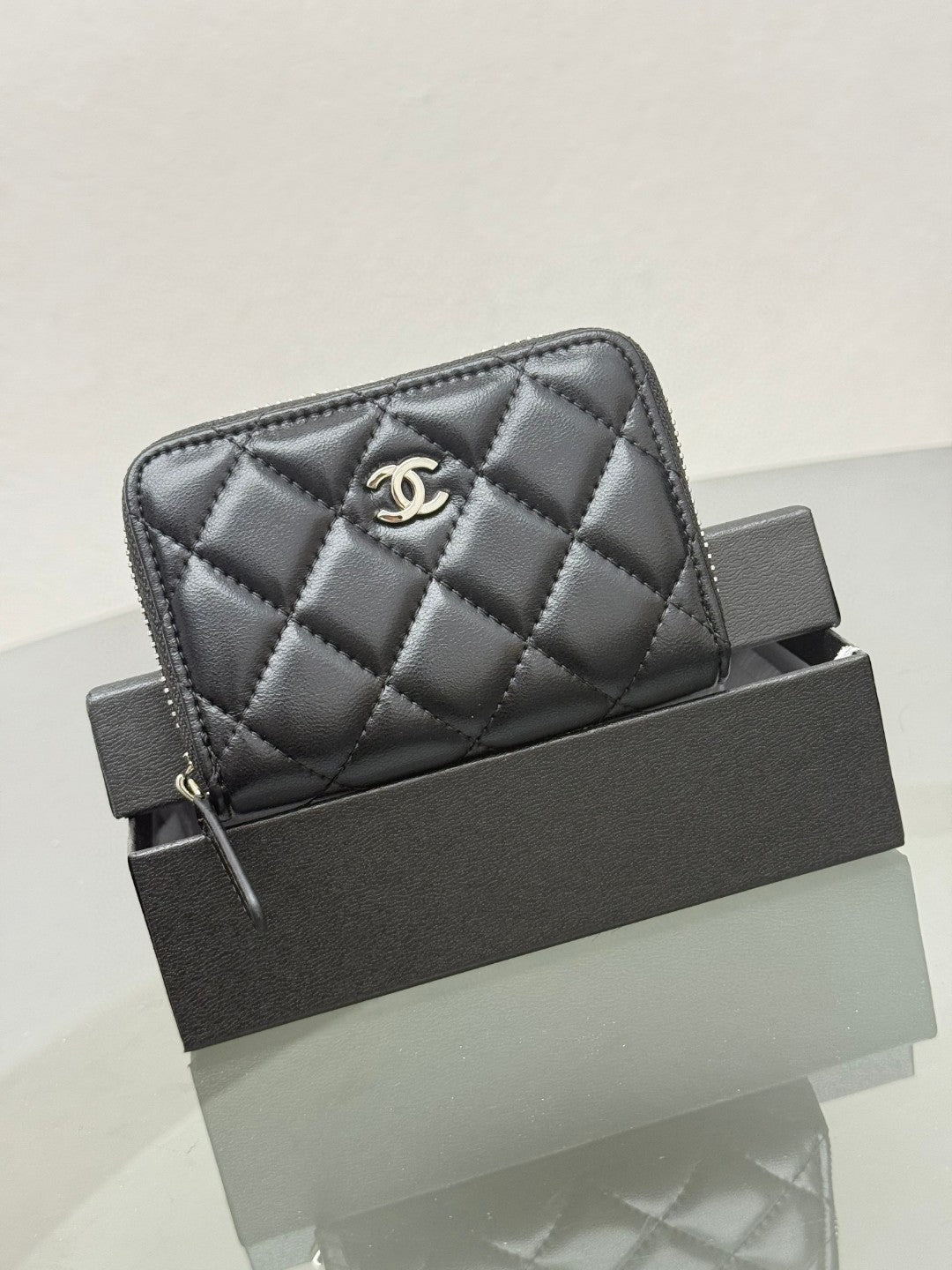 Chanel Classic Zipped Coin Purse in black quilted caviar leather with gold-tone hardware