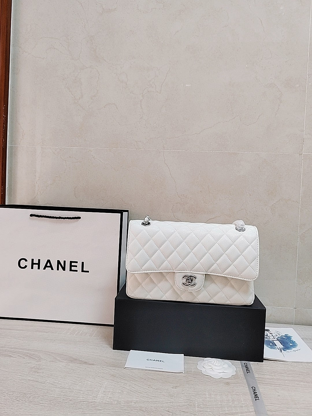 Chanel Classic Double Flap bag in white caviar leather with silver-tone hardware