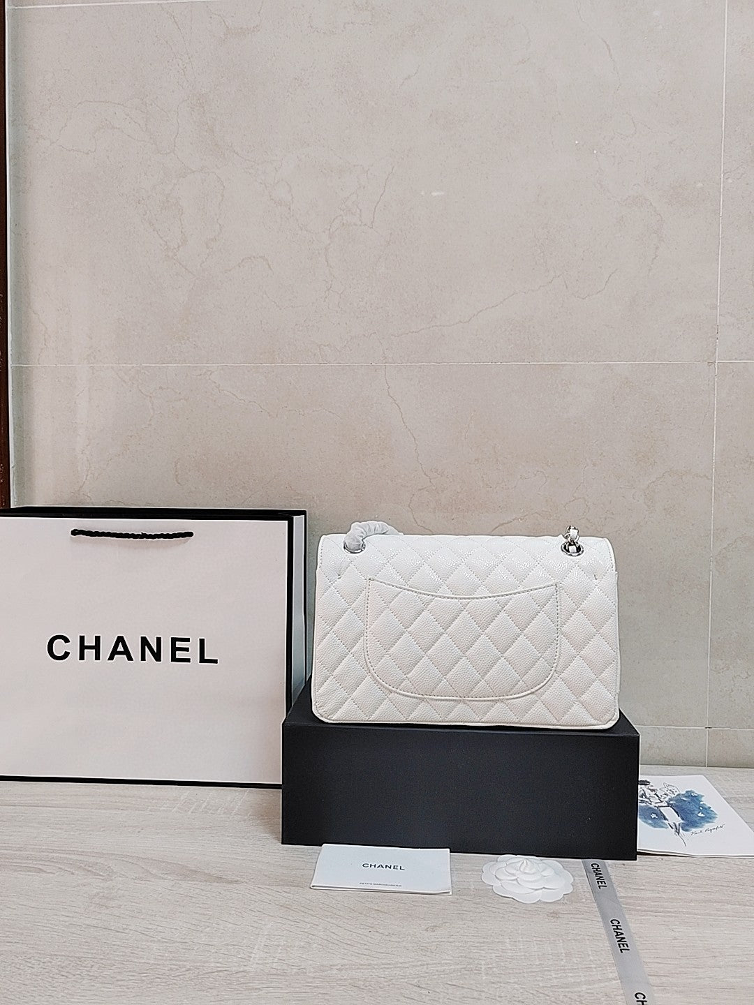 Chanel Classic Double Flap bag in white caviar leather with silver-tone hardware