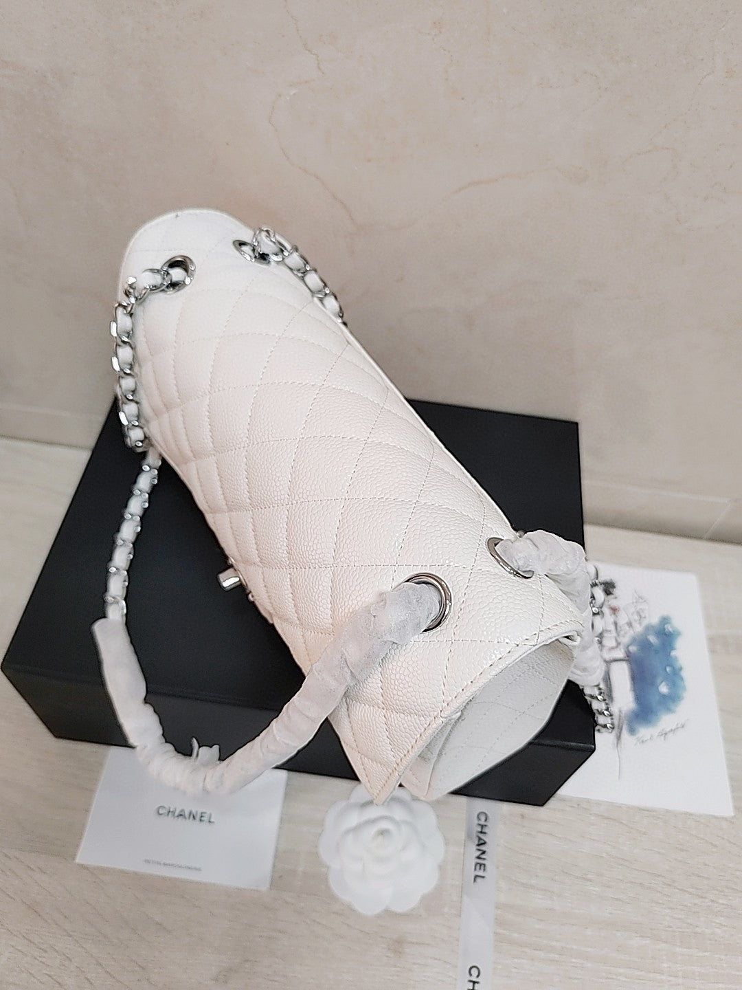 Chanel Classic Double Flap bag in white caviar leather with silver-tone hardware