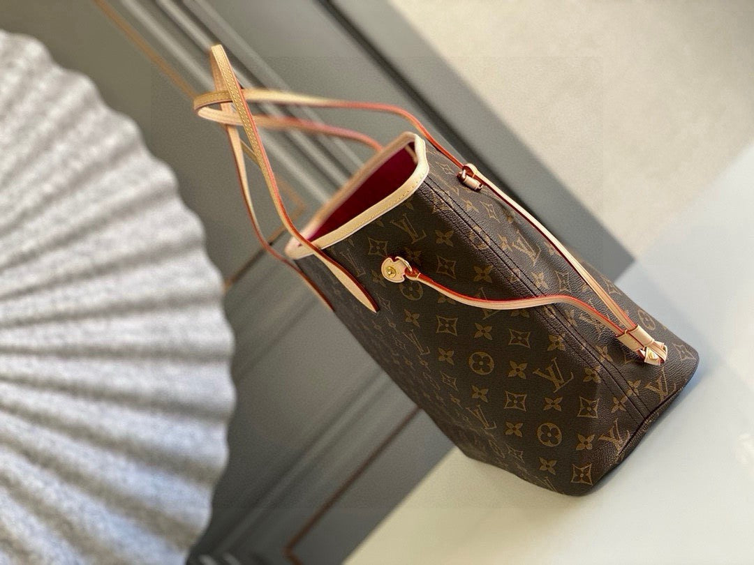 Louis Vuitton Neverfull MM tote bag in Monogram canvas with natural cowhide trim and a pivoine (pink) lining