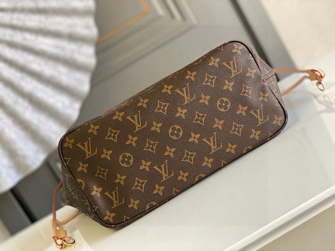 Louis Vuitton Neverfull MM tote bag in Monogram canvas with natural cowhide trim and a pivoine (pink) lining