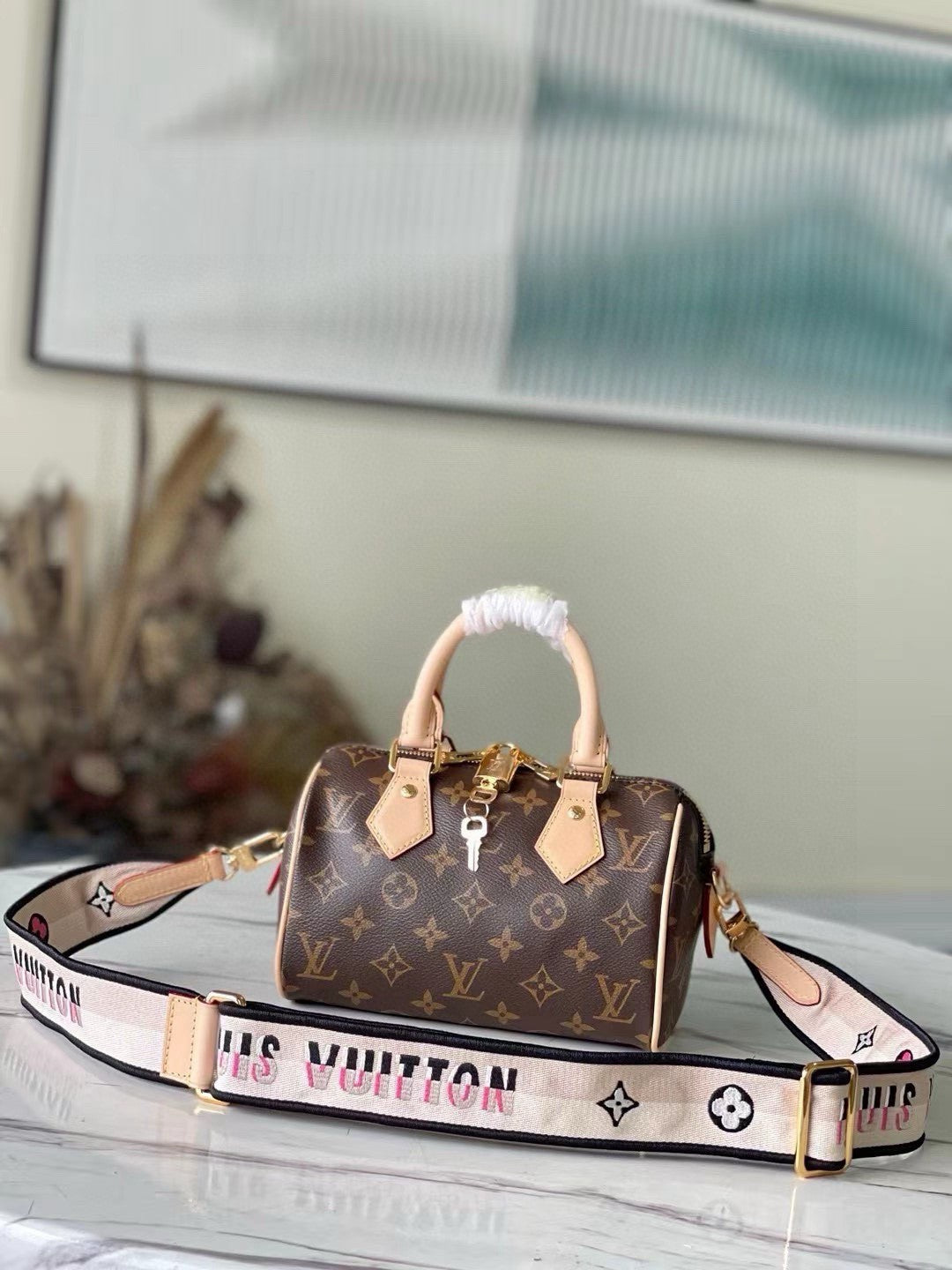 Louis Vuitton Speedy Bandoulière 20 handbag in Monogram canvas