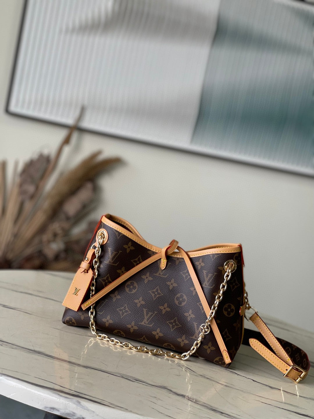 Louis Vuitton CarryAll BB bag in Monogram canvas