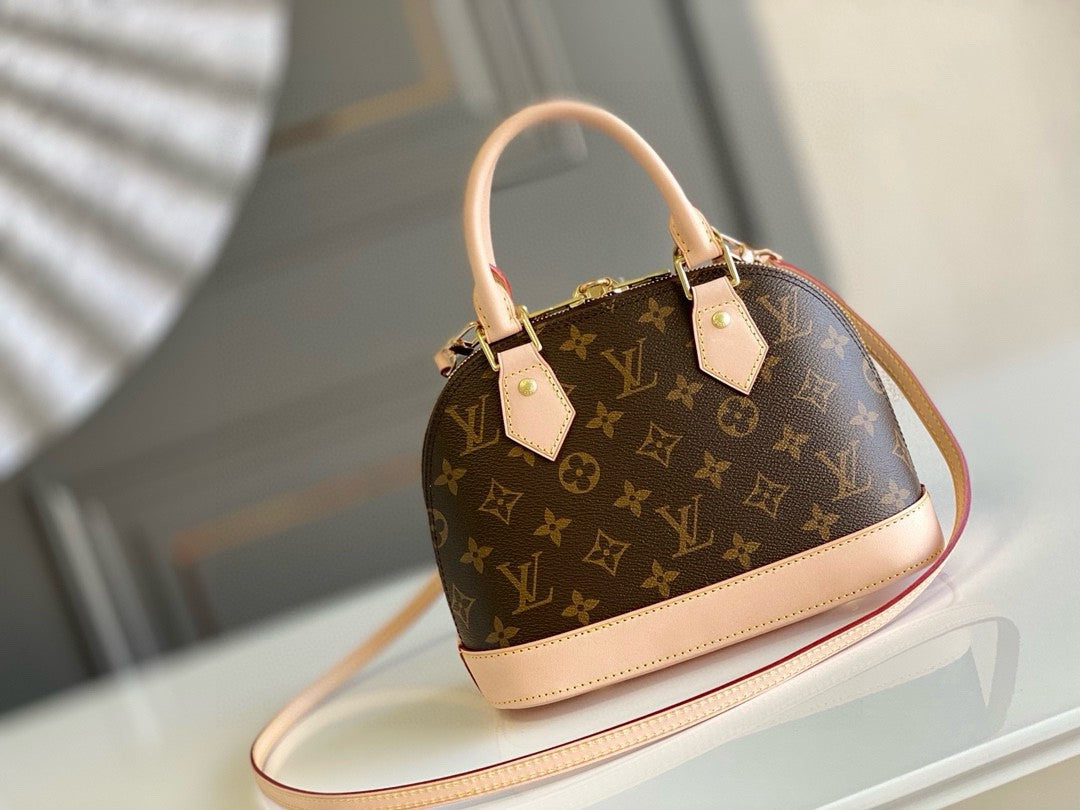 Louis Vuitton Alma BB handbag in Monogram canvas