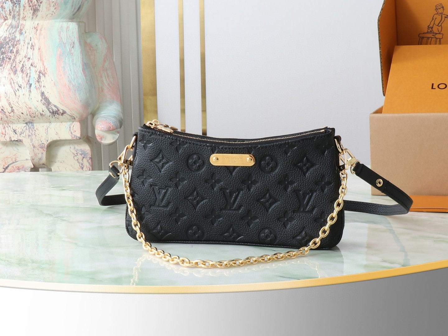 Louis Vuitton Pochette Liv or Easy Pouch On Strap in black Monogram Empreinte leather