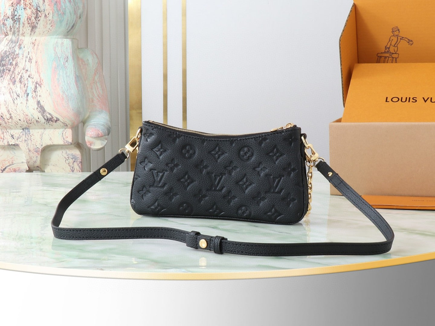 Louis Vuitton Pochette Liv or Easy Pouch On Strap in black Monogram Empreinte leather
