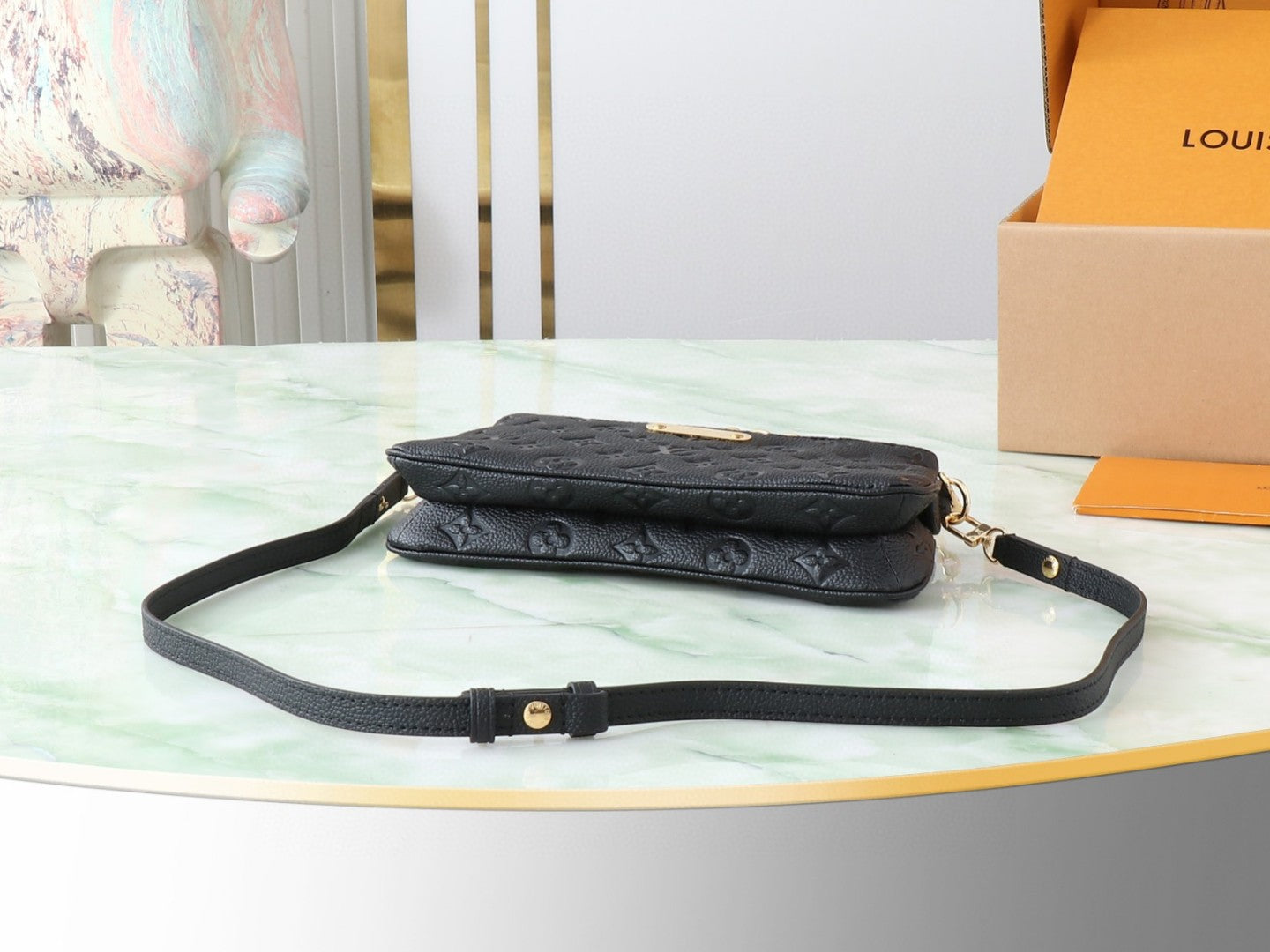 Louis Vuitton Pochette Liv or Easy Pouch On Strap in black Monogram Empreinte leather