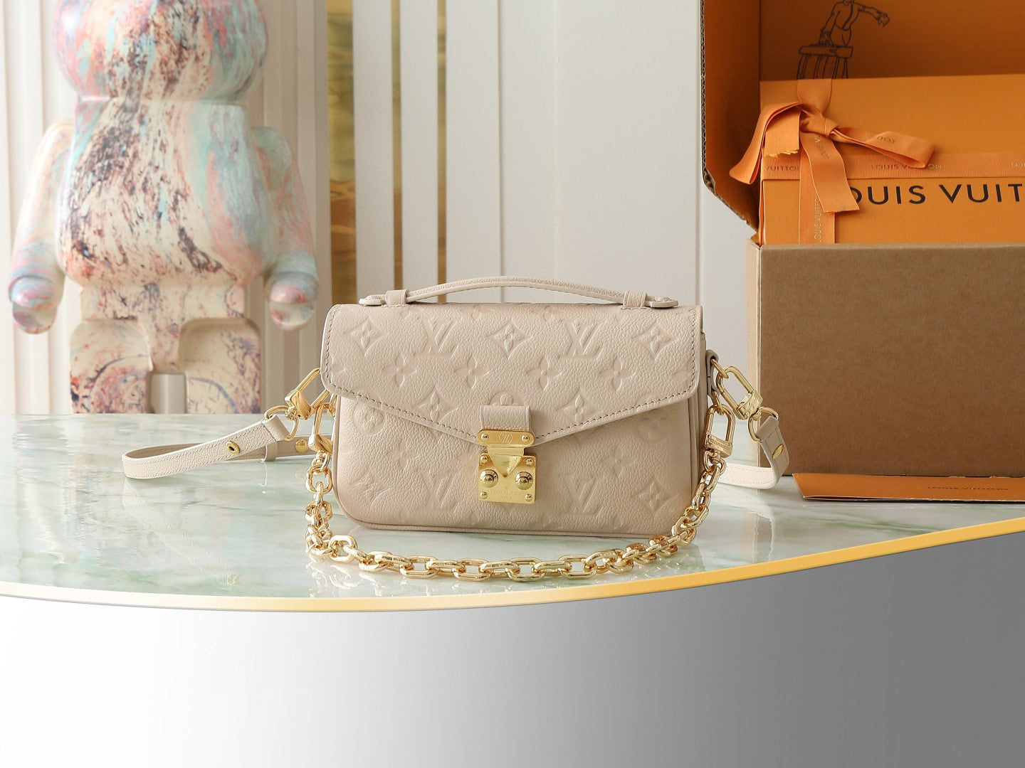 Louis Vuitton Pochette Métis East West handbag in embossed Monogram Empreinte leather