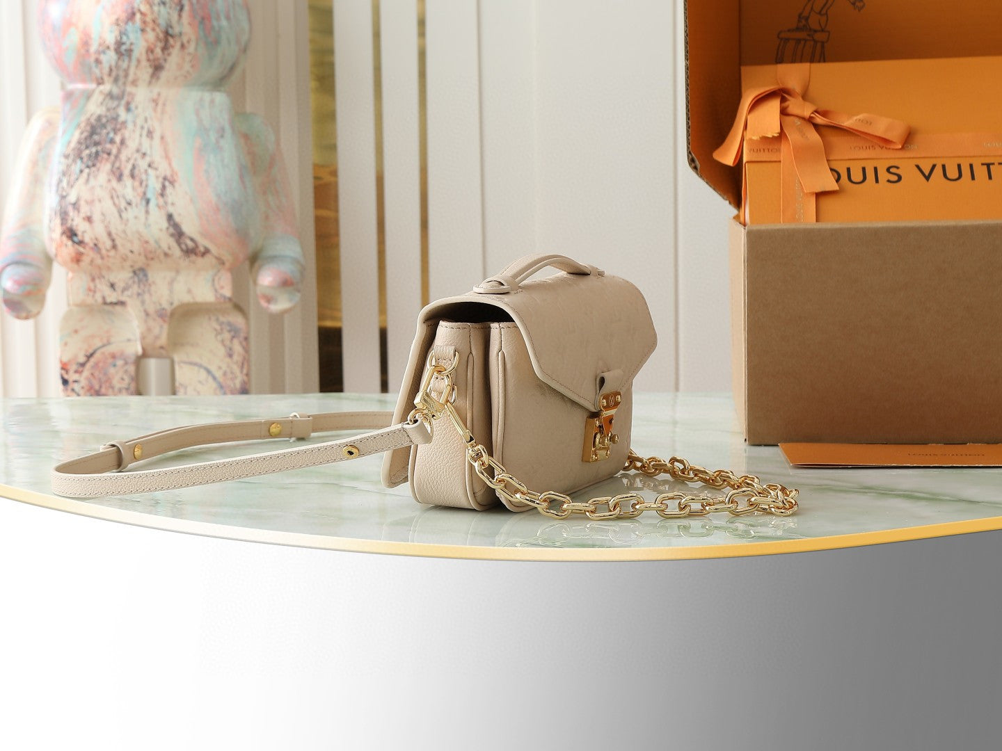 Louis Vuitton Pochette Métis East West handbag in embossed Monogram Empreinte leather