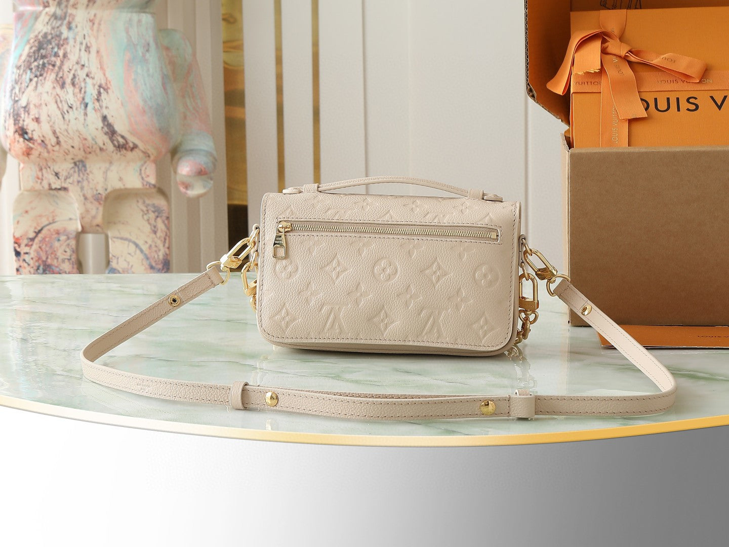 Louis Vuitton Pochette Métis East West handbag in embossed Monogram Empreinte leather