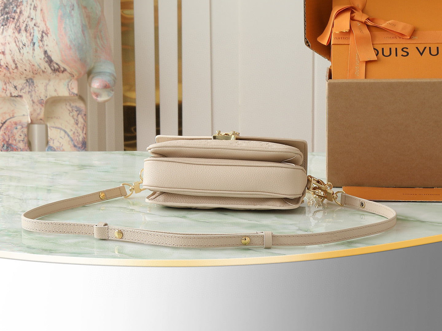 Louis Vuitton Pochette Métis East West handbag in embossed Monogram Empreinte leather