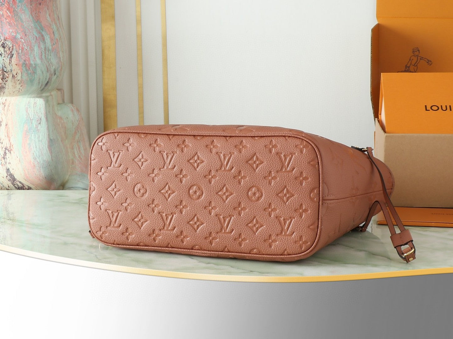 Louis Vuitton Neverfull MM tote bag in the Cognac brown Monogram Empreinte leather