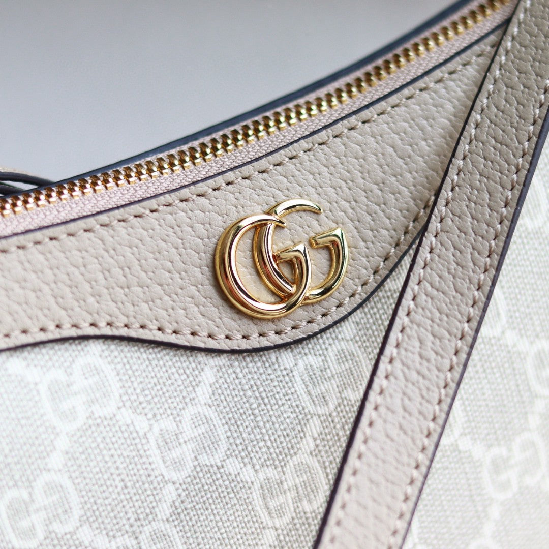 Gucci Ophidia Small GG Supreme shoulder bag in beige and white canvas with leather