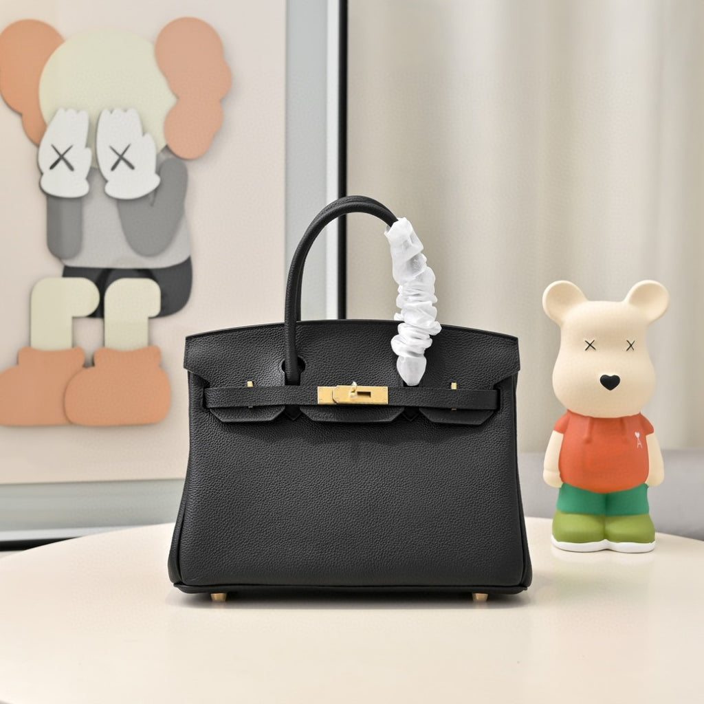 black Hermès Birkin handbag in Togo leather with gold hardware