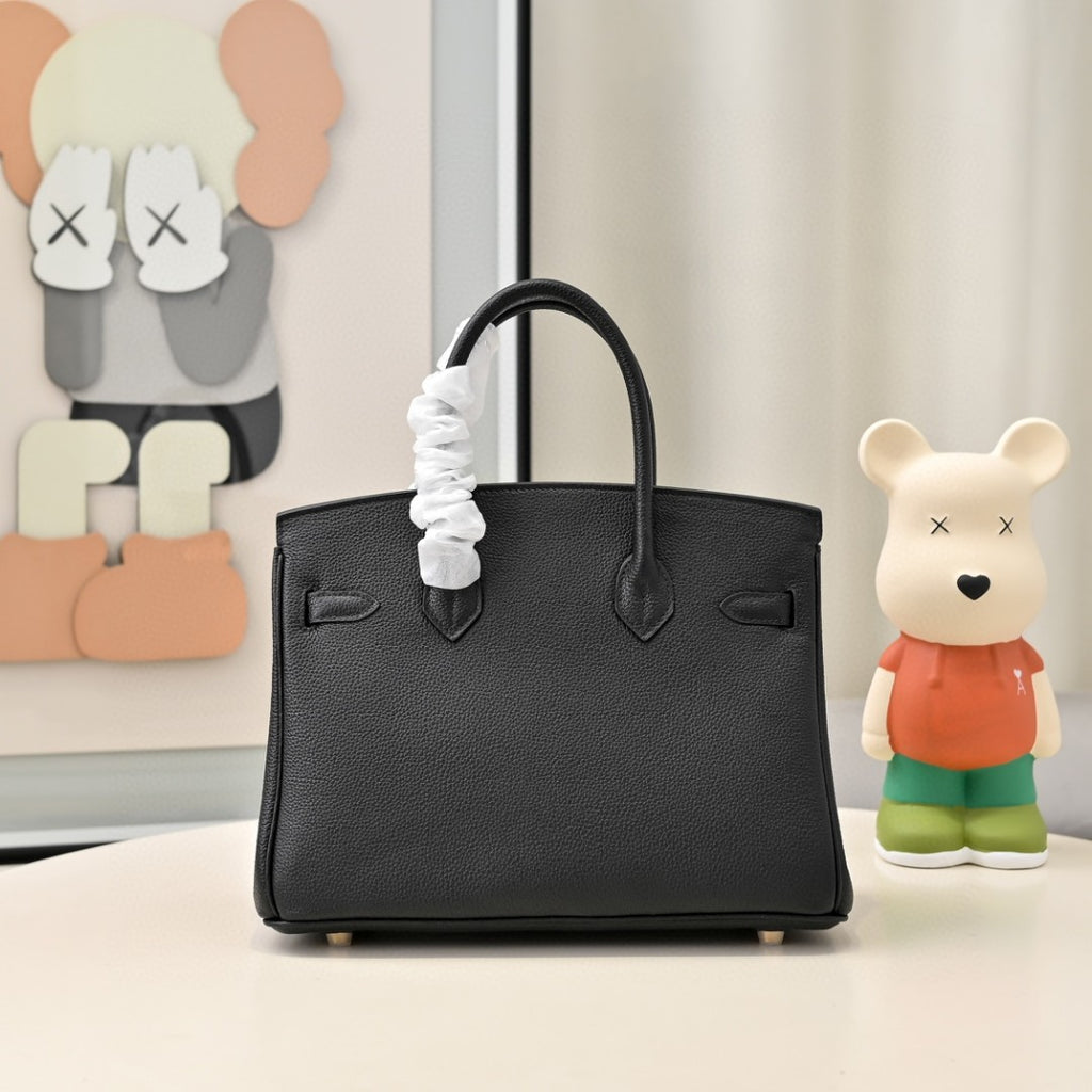 black Hermès Birkin handbag in Togo leather with gold hardware