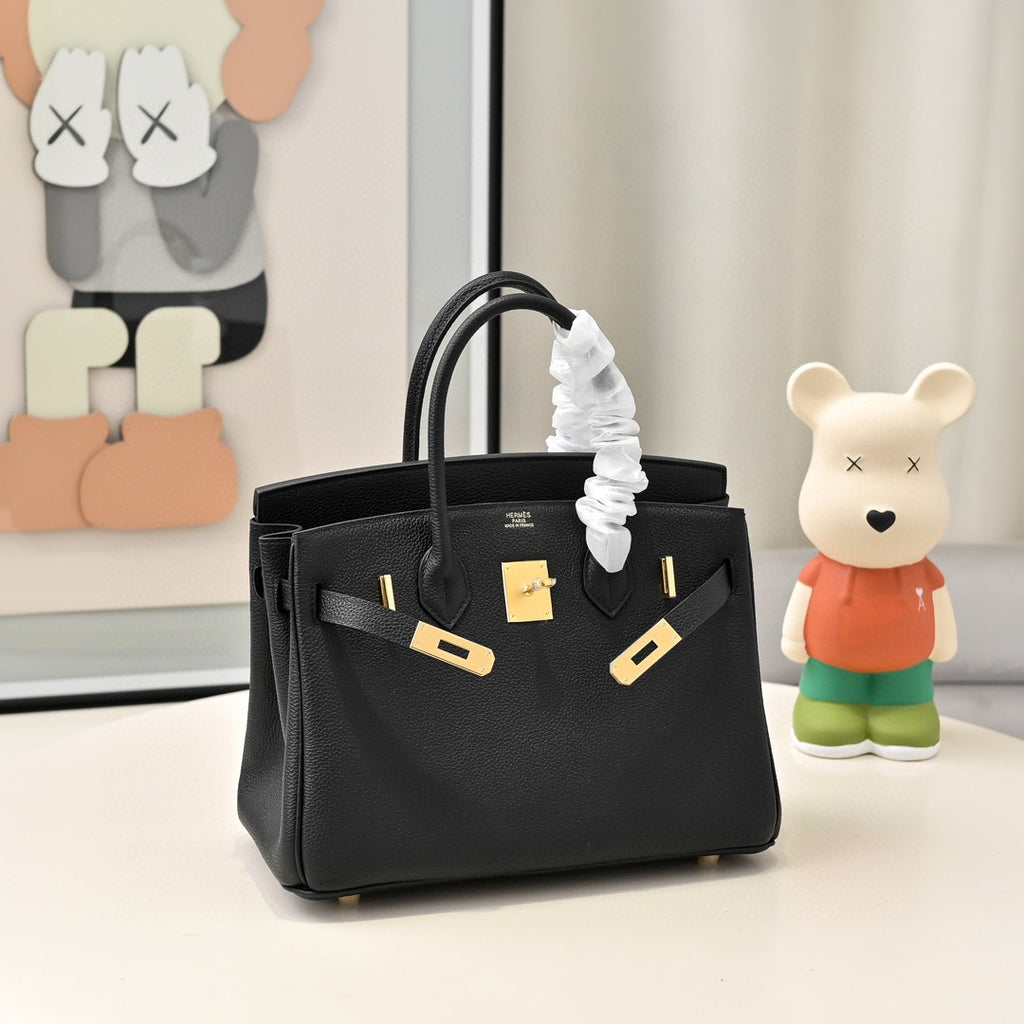 black Hermès Birkin handbag in Togo leather with gold hardware