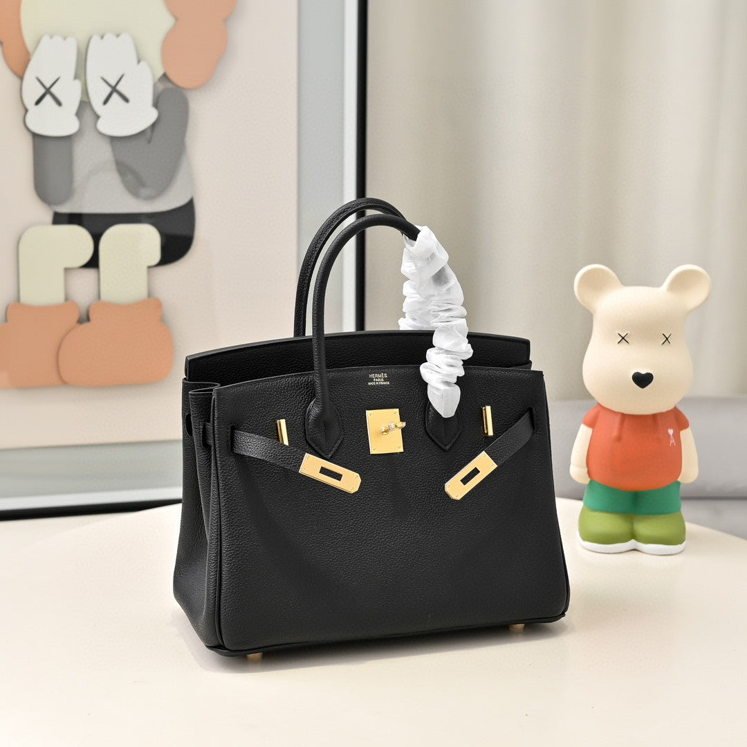 black Hermès Birkin handbag in Togo leather with gold hardware