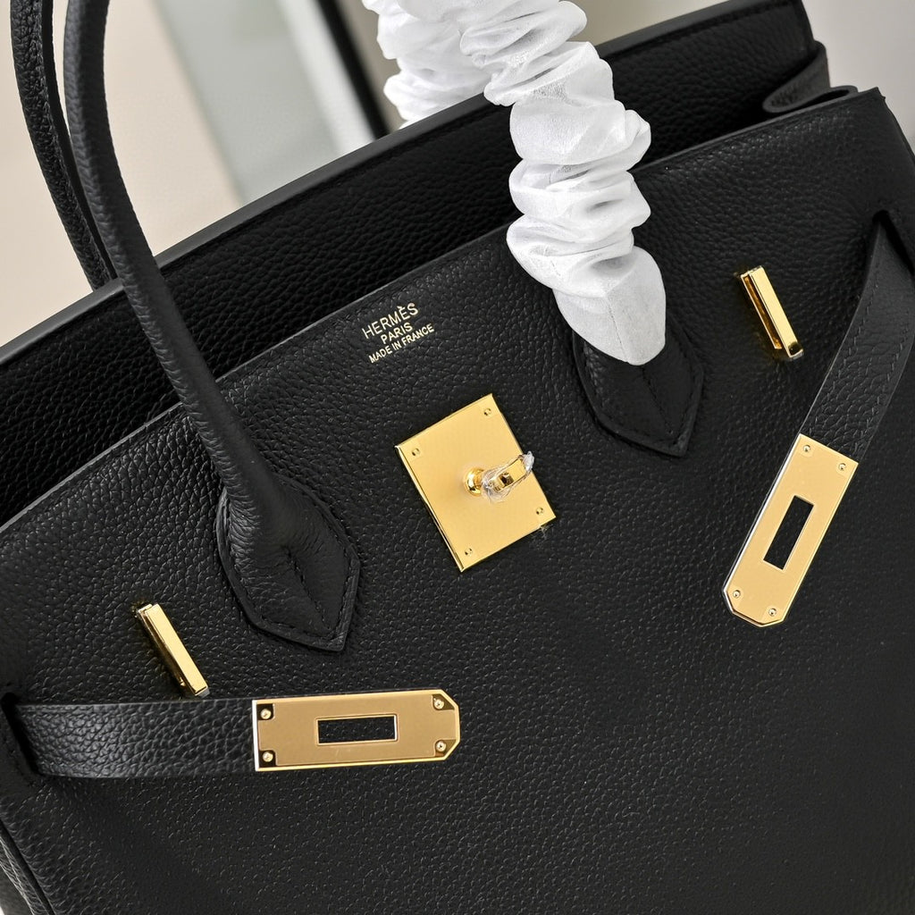black Hermès Birkin handbag in Togo leather with gold hardware