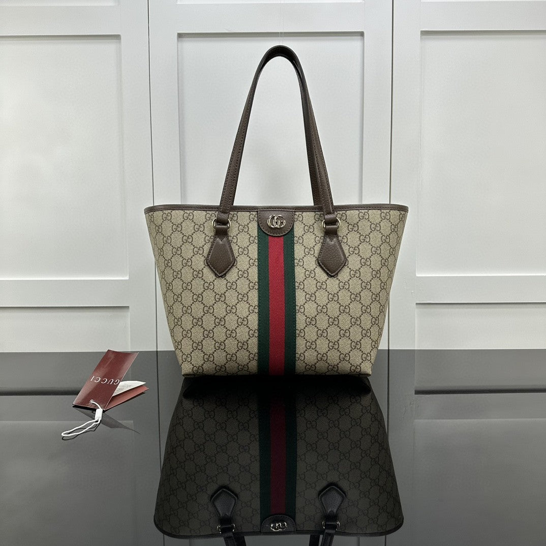Gucci Ophidia GG medium tote bag crafted from GG Supreme canvas with brown leather trim and the signature green and red Web stripe