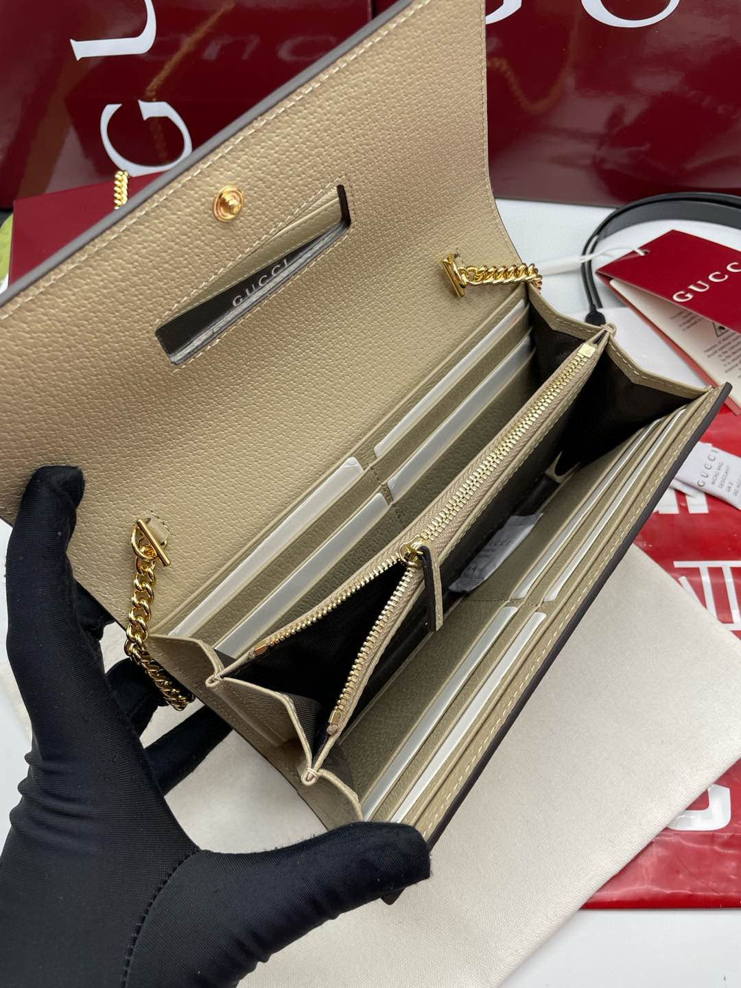 Gucci Ophidia chain wallet in beige/ebony GG Supreme canvas with brown leather trim and a green and red Web stripe