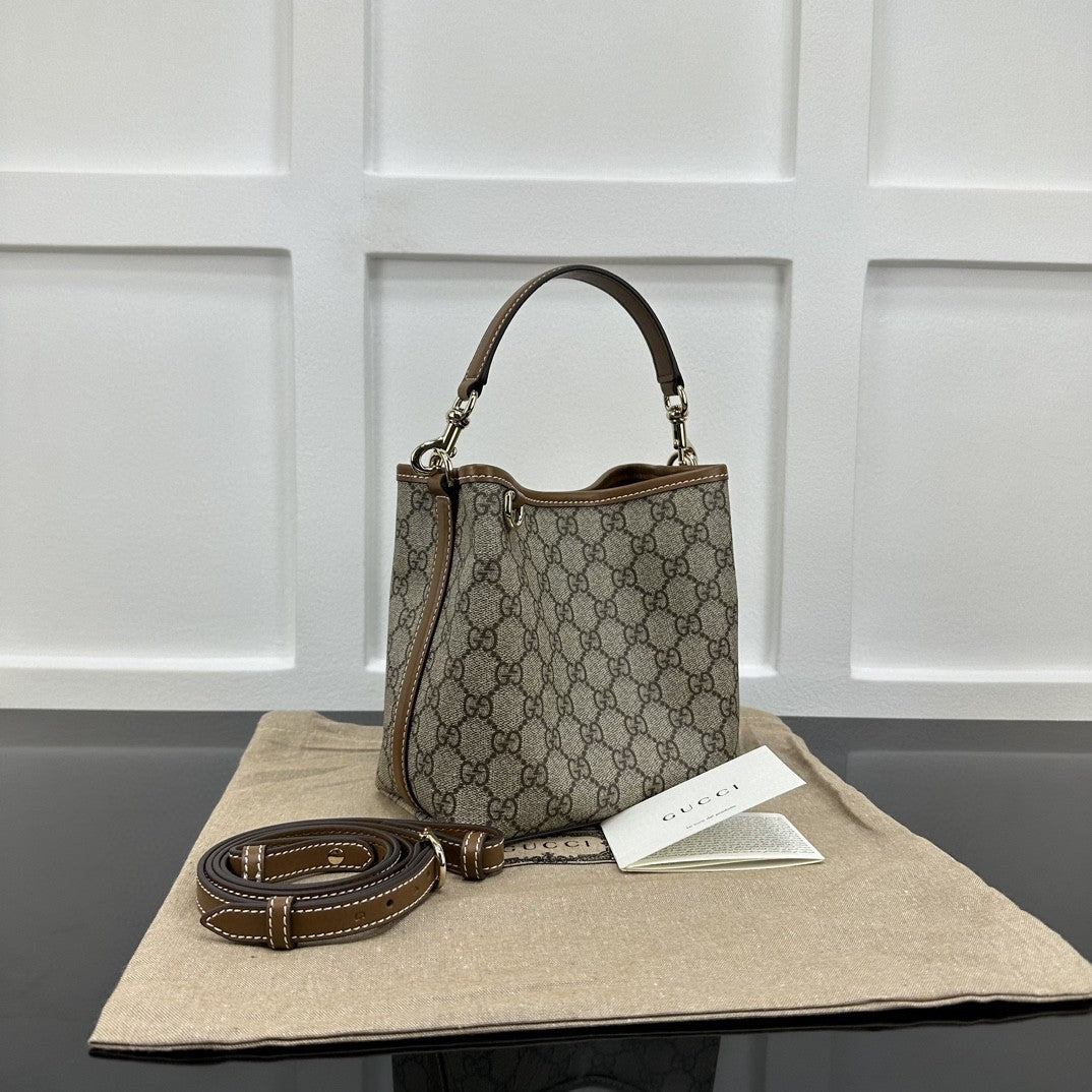Gucci GG Emblem Small bucket bag in beige and ebony coated canvas with brown leather trim