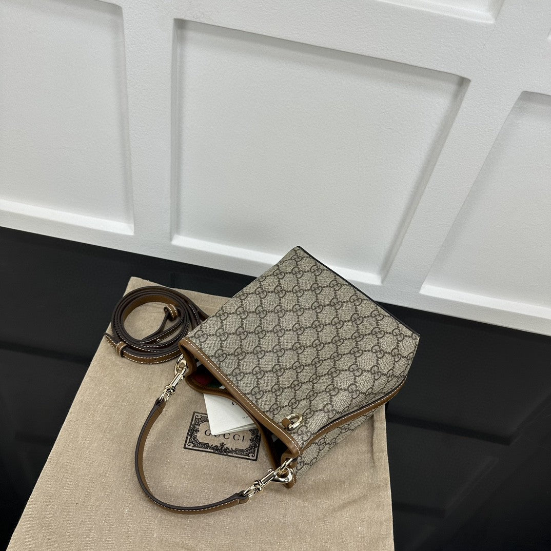 Gucci GG Emblem Small bucket bag in beige and ebony coated canvas with brown leather trim