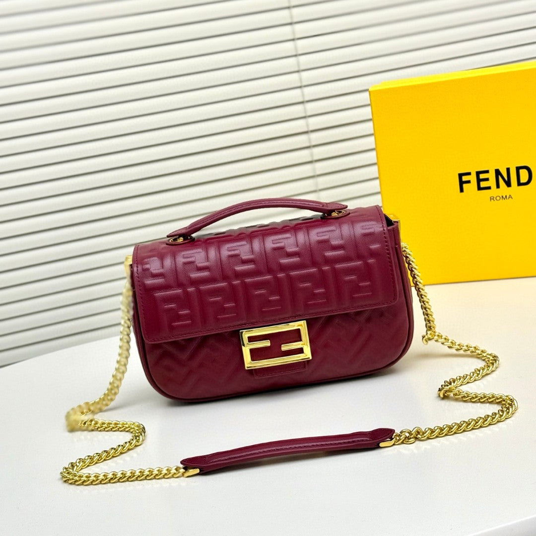 Fendi red FF embossed leather Midi Chain Baguette bag