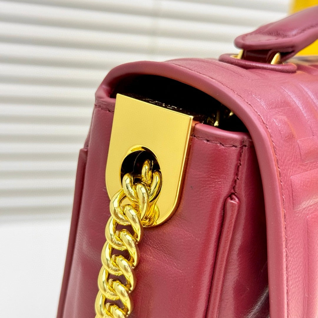 Fendi red FF embossed leather Midi Chain Baguette bag